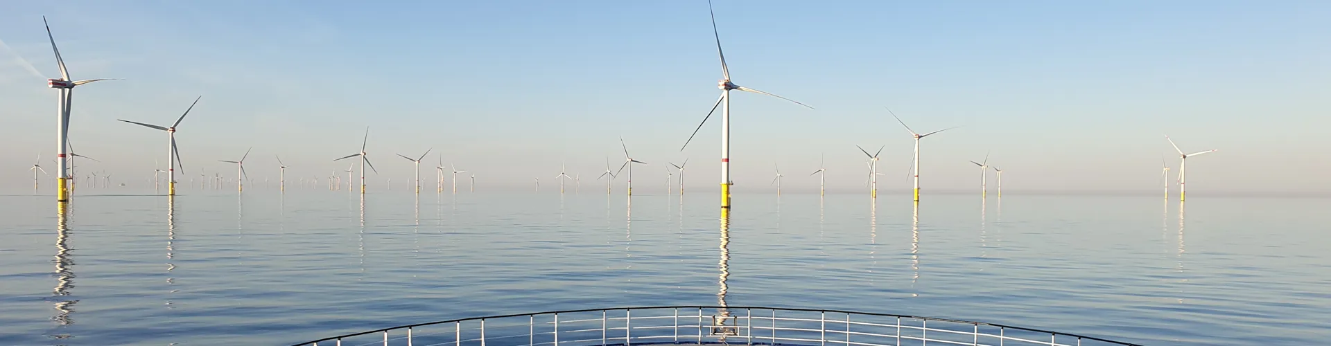 View from the deck of an offshore vessel looking out across an offshore wind farm
