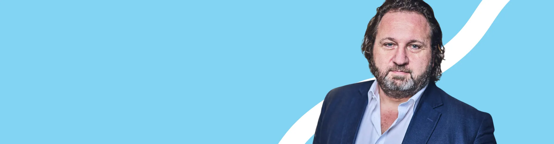CEO, blue background, man looking